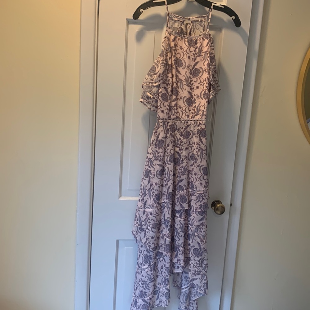 The most beautiful cut and pattern Keepsake dress. Flowy skirt, cutout back